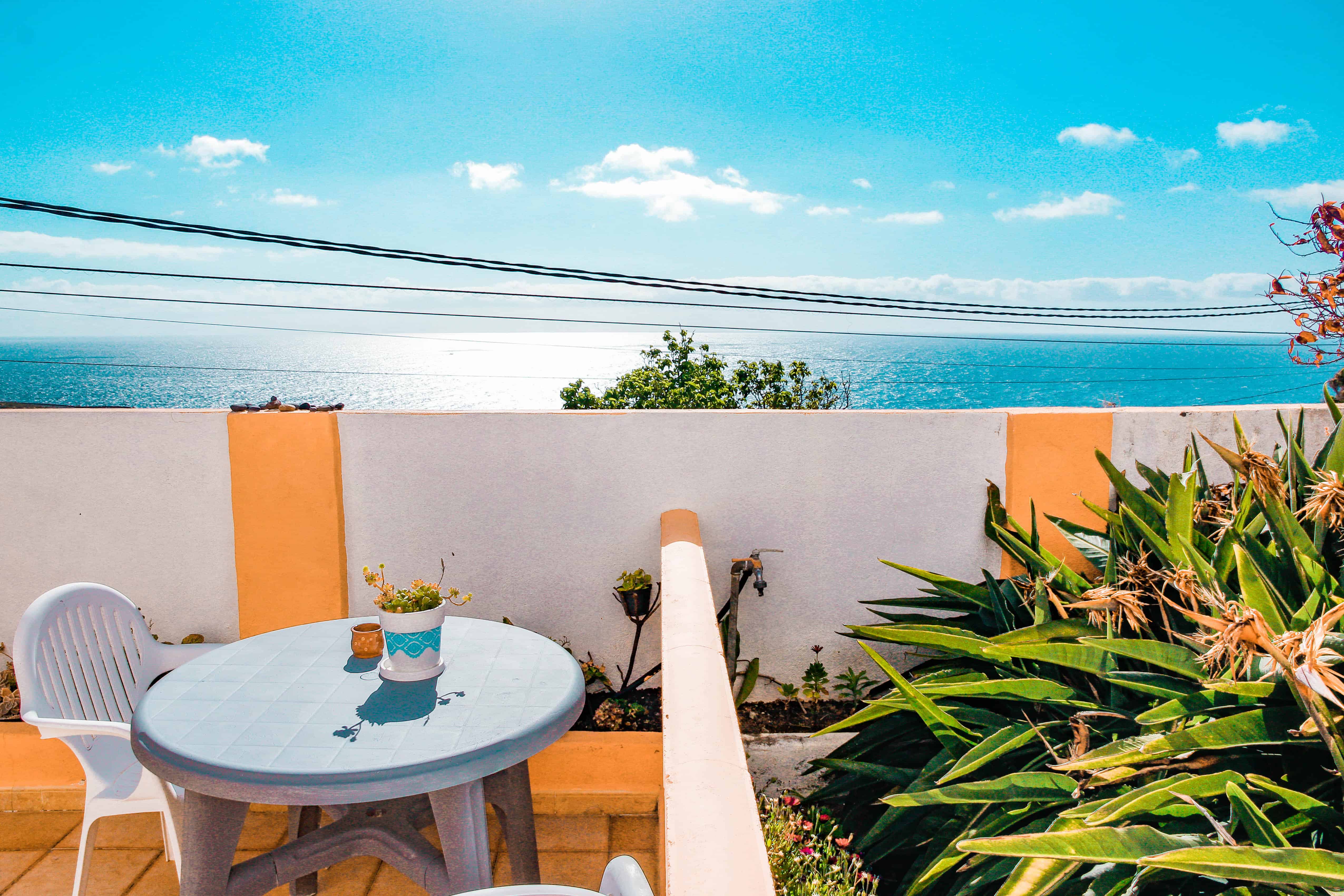 Morning breakfast spot with ocean view in La Palma, Canary Islands. Paradise home in La Palma, article by Kiss My Backpack at https://www.kissmybackpack.com/