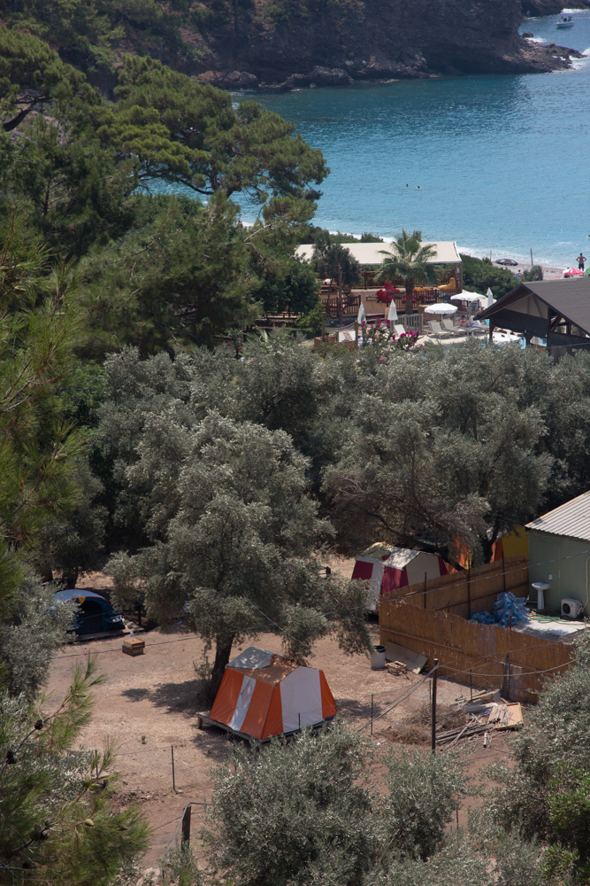 Kabak Koyu seen from the walk down from Sultan's Camp. Tents, beach and trees.